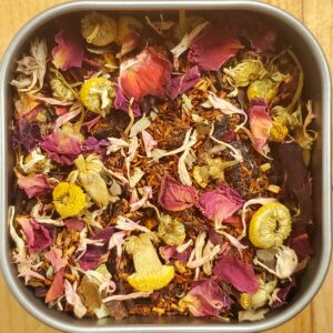 loose leaf rooibos tea with rose, chamomile, cornflower, and cherrries